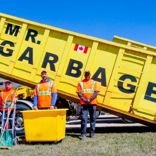 Mr Garbage team with yellow dumpster – garbage bin rental Winnipeg, cheap bin rentals, and junk removal services.
